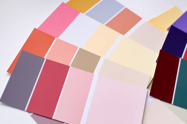 istock Color palette with various samples. Light background. Paint selection cards, close-up. 1179885314