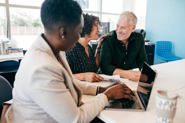 istock Couple and financial advisor 1179885646