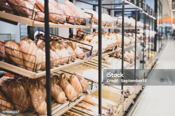 Bakery Showcase Freshly Baked Bread Presentation Of Bread In A Shop Window Of A Hypermarket Stock Photo - Download Image Now