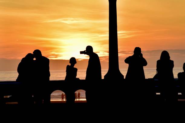 istock People gathered to watch sunset 1179887966