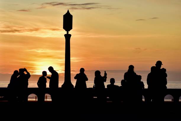 istock People gathered to watch sunset 2 1179887973