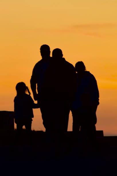 istock Family in Silhouette 1179888029