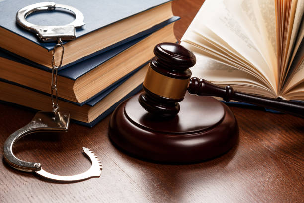 istock Gavel, books and handcuffs 1179889015