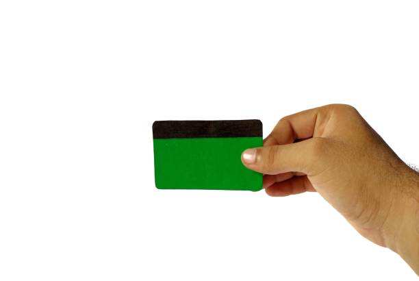 istock Hand holding an empty green credit card on white background. finance concept 1179893390