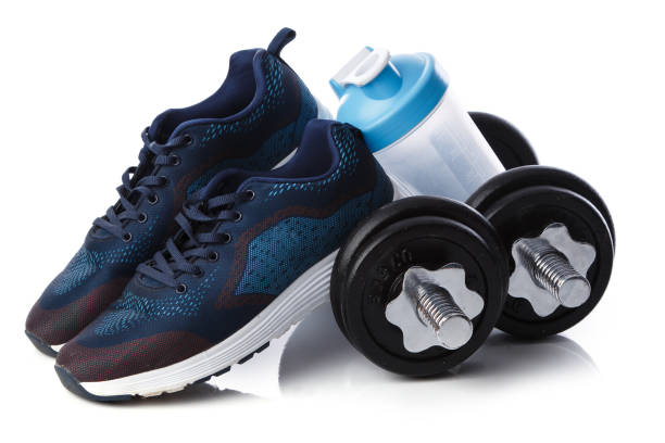 istock Dumbells, sneakers and shaker 1179893542