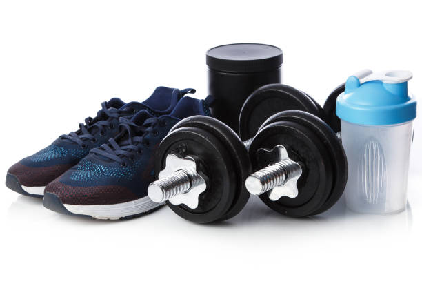 istock Dumbells, sneakers and shaker 1179893548