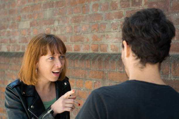 istock Young couple having argument and quarrelling with each other 1179894426