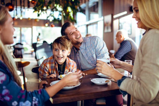 istock Family in a Cafe 1179894589