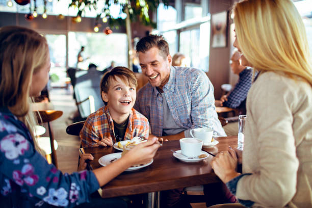 istock Family in a Cafe 1179895337