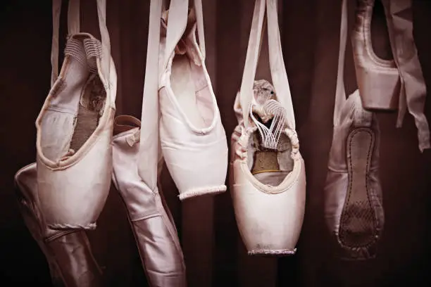 Several ballet shoes