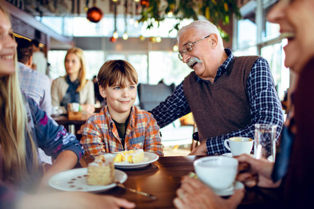 Close up of a happy family enjoying time together in a cafe