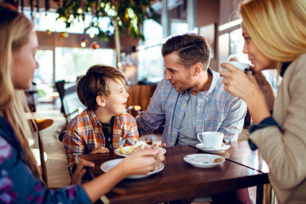istock Family in a Cafe 1179910452