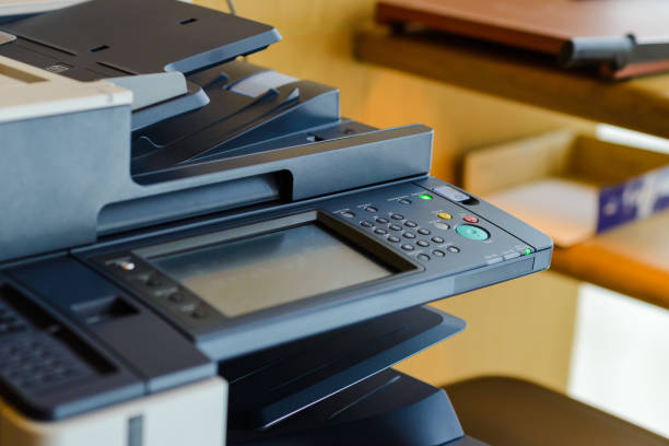 istock button on panel of copy machine or photocopier in office 1179910509