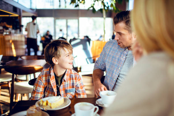 istock Family in a Cafe 1179910631