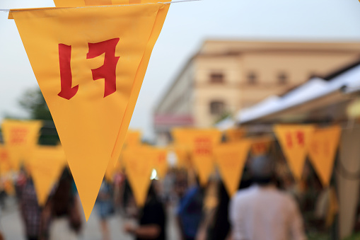 Bangkok, Thailand - October 5, 2013: The yellow flag decorated in Thai vegetarian food festival at Bangkok, Thailand.