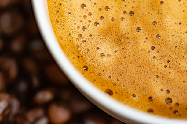 istock Cup of latte coffee and coffee beans 1179919990