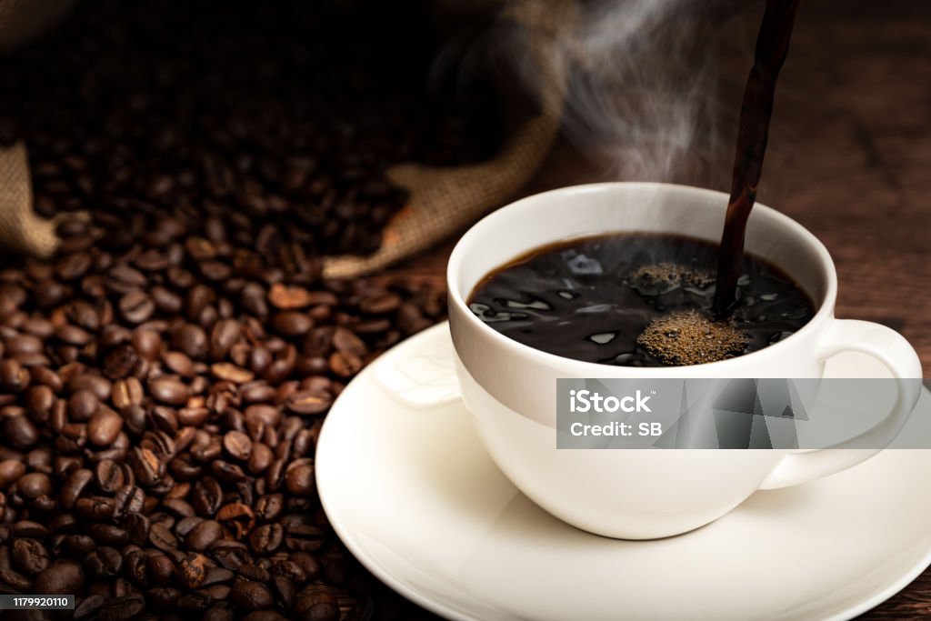 Coffee cup and coffee beans Coffee - Drink Stock Photo