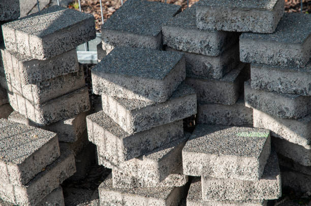 istock concrete paving stones stacked at construction site 1179921528
