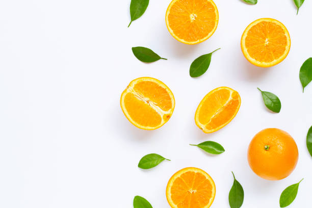 istock Fresh orange citrus fruit with leaves isolated on white background. 1179921561