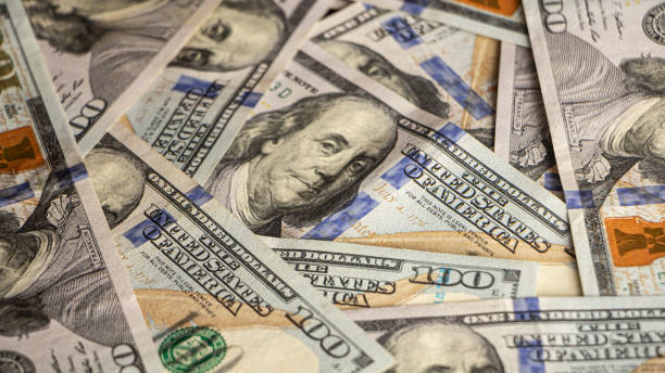 istock Background or texture with money american hundred dollar bills 1179928456