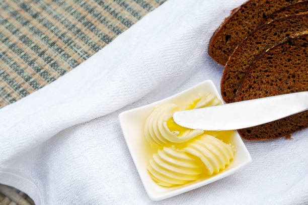 Slices of bread and butter on the table