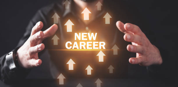 istock Man holding New Career text with arrows. 1179934360
