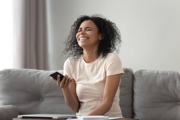 istock Overjoyed black woman feel excited with cellphone message 1179938861
