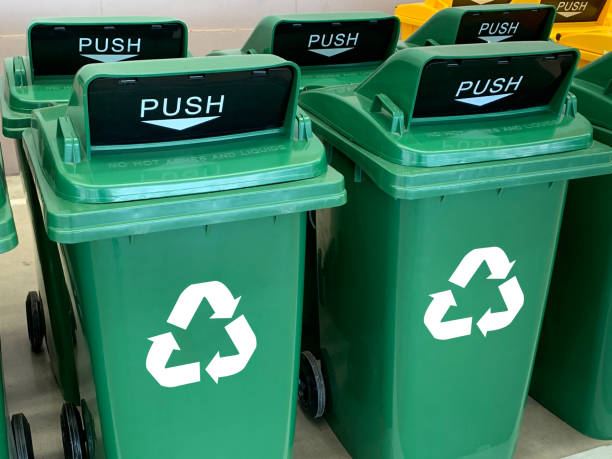 istock recycle bin yellow blue green and recycle plastic garbage bin to save environment care 1179940936