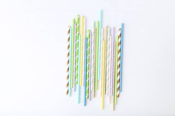 istock Colorful paper straws on white background 1179943767