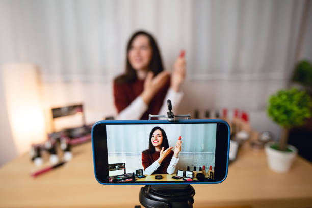 istock Woman vlogging about makeup 1179945884