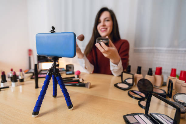 istock Woman vlogging about makeup 1179945926