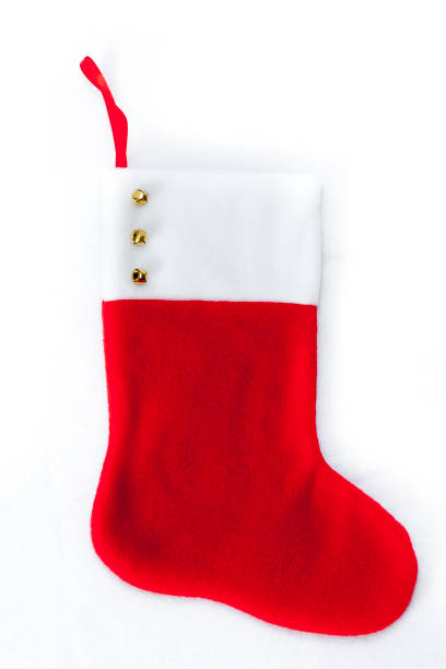 istock New Year sock for presents/new year decoration for a fireplace 1179947459