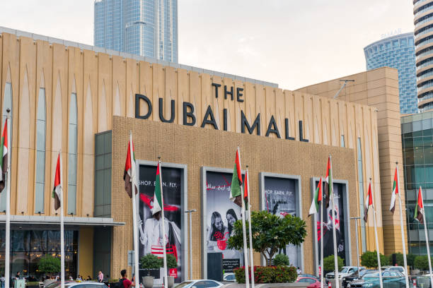 Main entrance of the Dubai Mall, the world’s largest destination for shopping, entertainment and leisure located next to the world's tallest building, the Burj Khalifa. stock photo