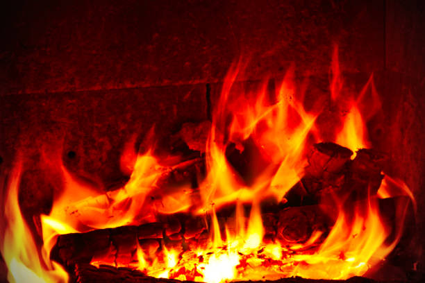 istock Wood burning in fireplace at home 1179949106