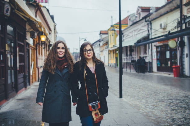 istock Two female friends going for a walk downtown 1179952007