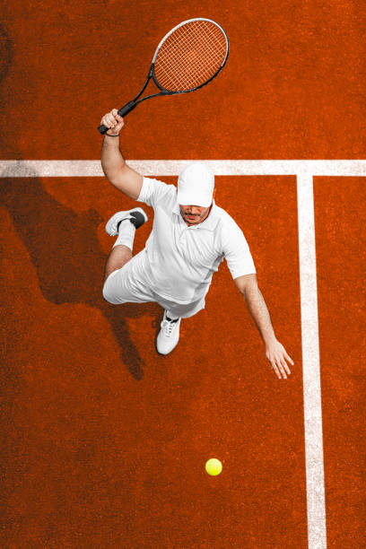 istock Handsome man on tennis court 1179953255