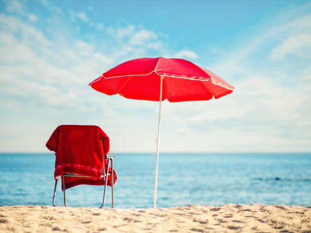 istock Umbrella and chair on the beach 1179954455