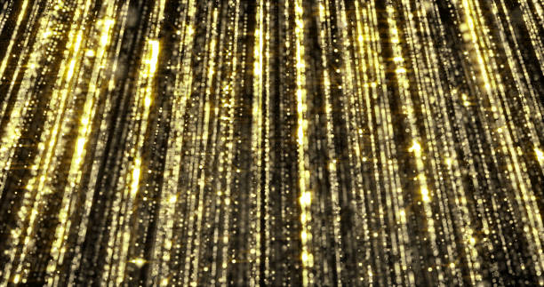 istock Golden glitter curtain background, gold glittering particles flowing, magic light sparks. Glowing sparks threads and shiny sparkling shimmer glare 1179956617
