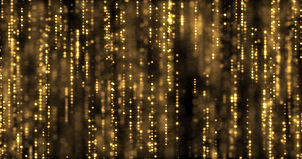 istock Golden glitter flowing particles with bokeh light sparks backdrop. Gold glitter falling curtain background 1179957725