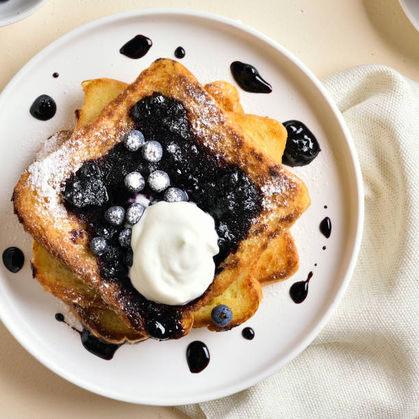 istock French toasts with blueberry sauce 1179959541