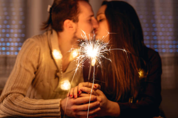 istock Couple with sparklers 1179963356