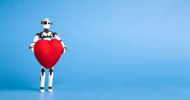 istock Cute robot holding red heart, blue panorama background 1179963888