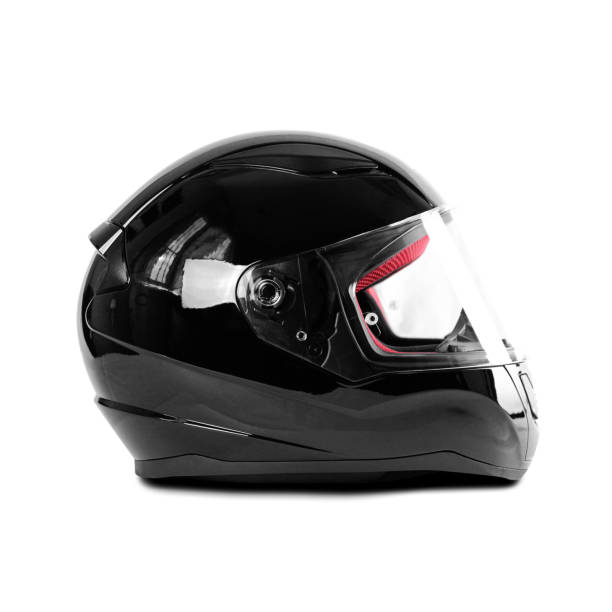 istock Black glossy motorcycle helmet. Close up. Isolated on white background 1179964237