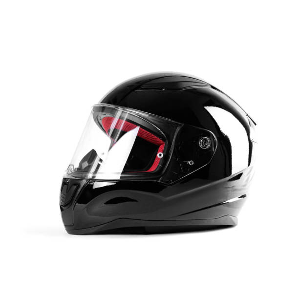 istock Black glossy motorcycle helmet. Close up. Isolated on white background 1179964239