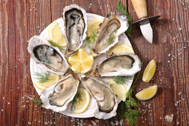 istock platter with oyster, dill and lemon 1179964389