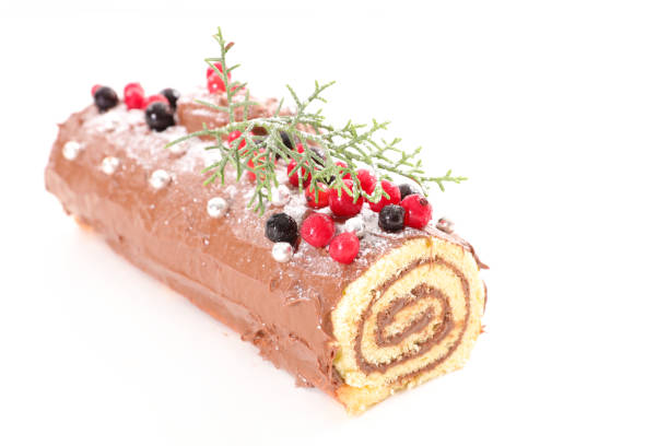 istock yule log, christmas pastry with chocolate and berries fruit on white background 1179964427