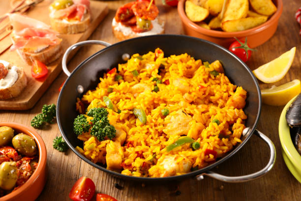 istock cooking pan with paella with seafood 1179964489