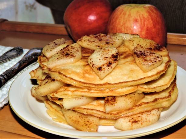 istock New autumn, new harvest. Pancakes with apples. 1179964607