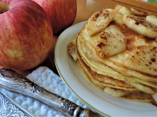 istock New autumn, new harvest. Pancakes with apples. 1179964659