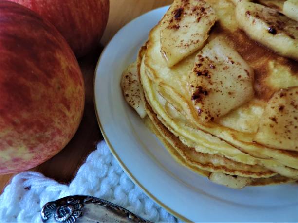 istock New autumn, new harvest. Pancakes with apples. 1179964663